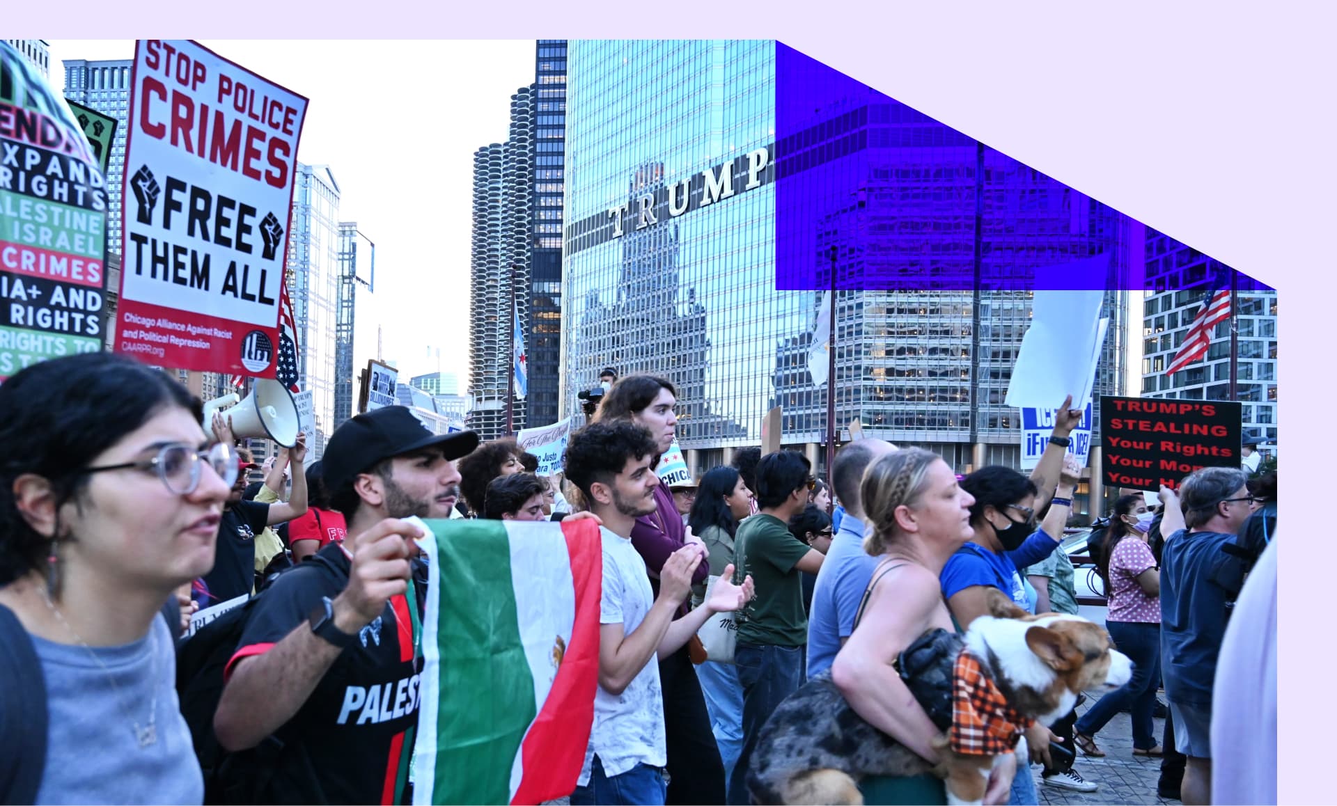 Demonstrators march through downtown Chicago, chanting and waving signs opposing ICE and troop deployment during an emergency protest in Chicago