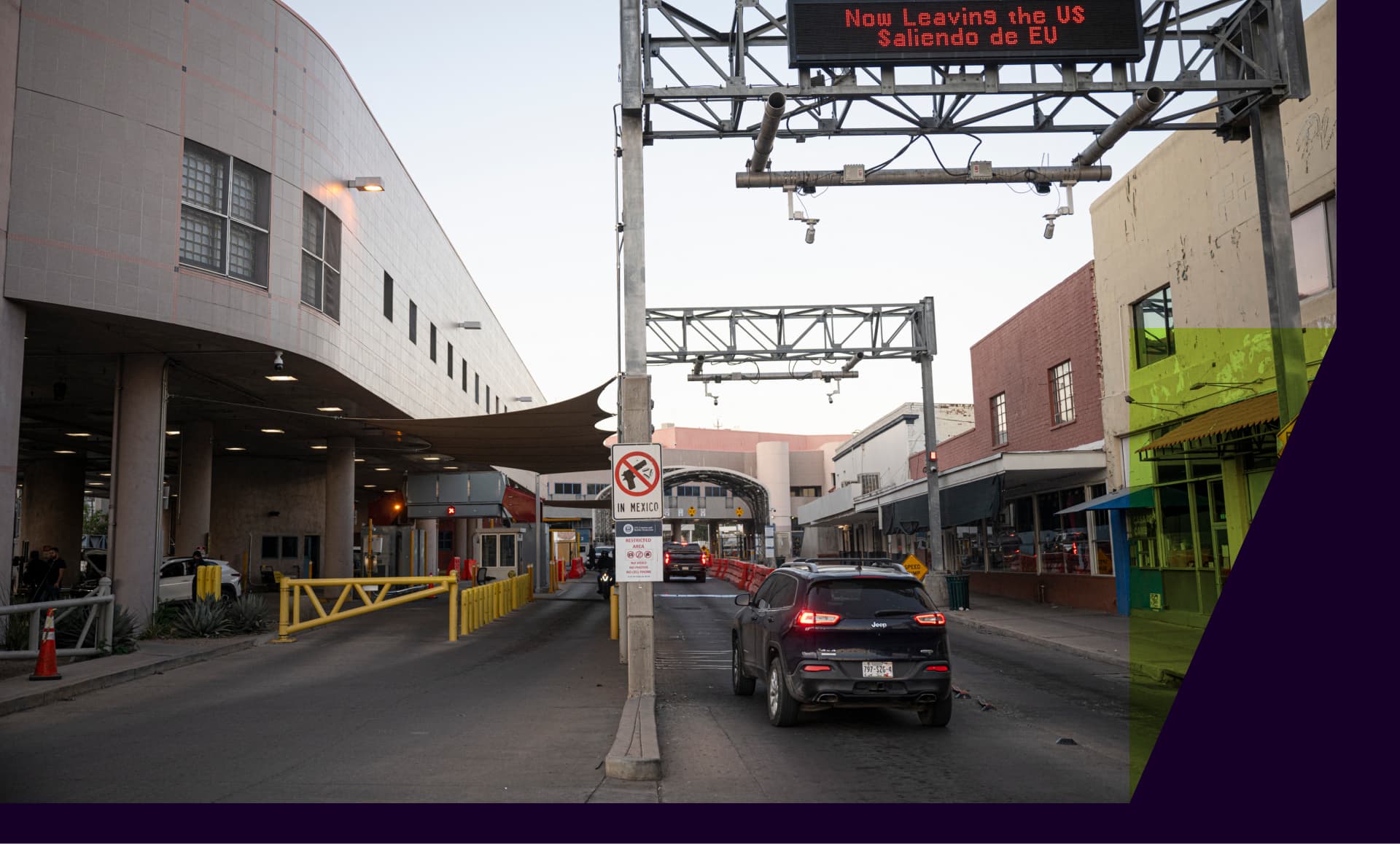 Vehicles cross a US-Mexico border checkpoint
