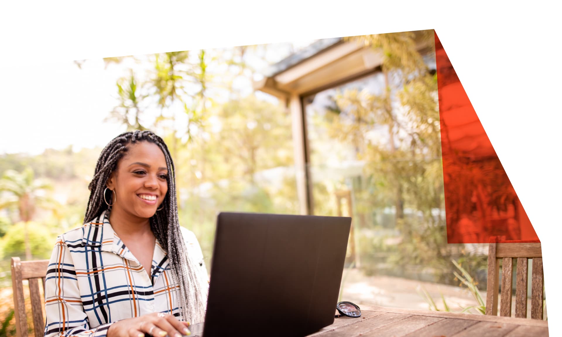woman outside with laptop