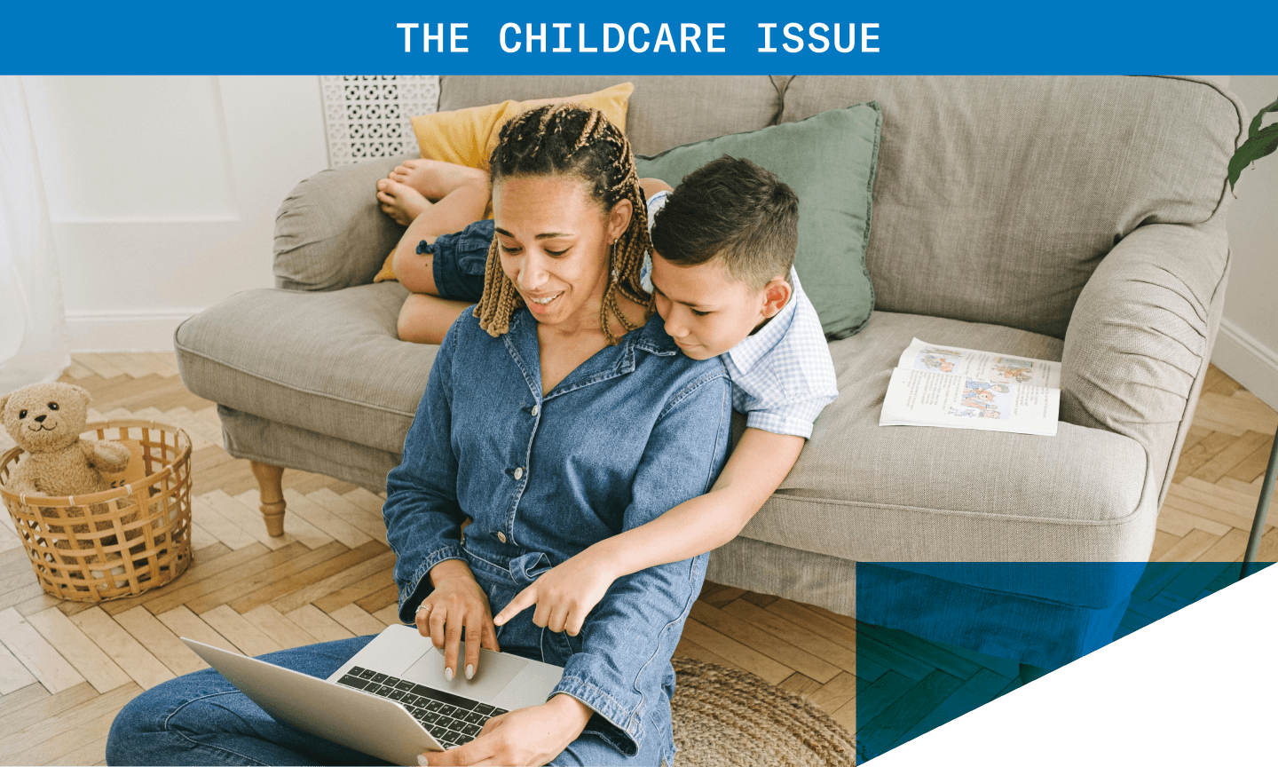 mom and son looking at laptop