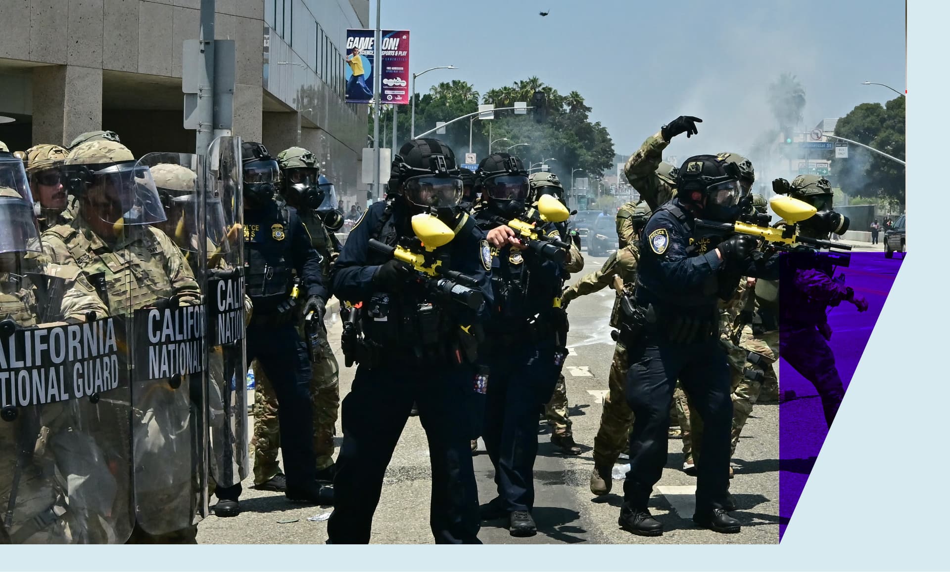 National Guard soldiers and US Department of Homeland Security (DHS) Police officers clash with demonstrators outside the Metropolitan Detention Center, MDC, in downtown Los Angeles